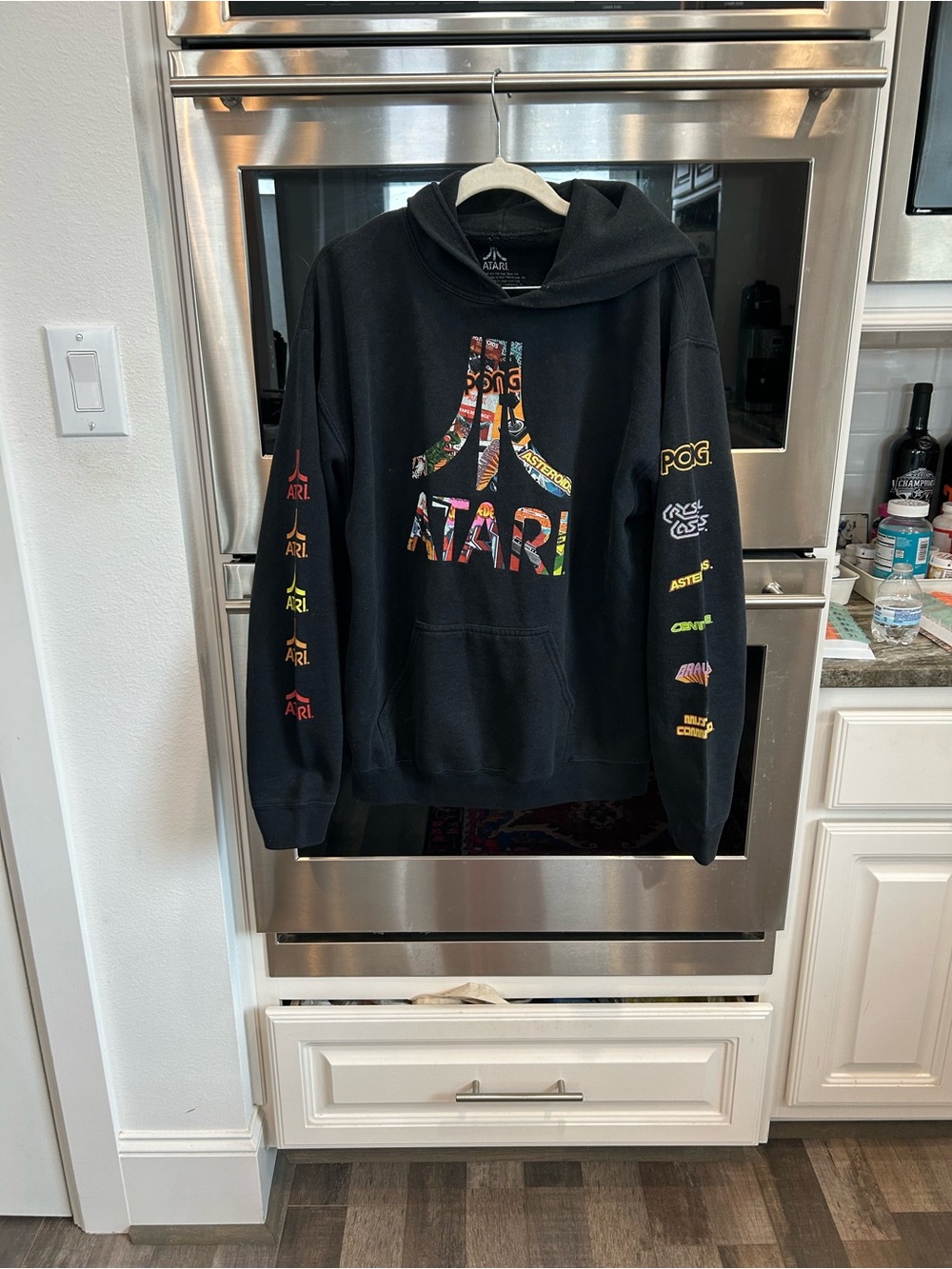 Atari Black Logo Pullover Hoodie size M has wear missing drawstring